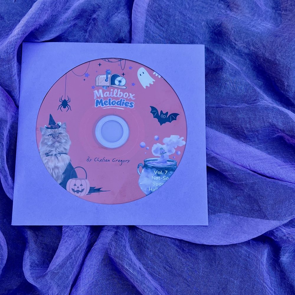 The Halloween Mailbox Melodies CD in its sleeve